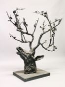 A LARGE AND UNUSUAL CAST BRONZE SCULPTURE, modelled as a deer's head with floral antlers. Approx.4ft