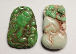 TWO JADE CARVED PENDANTS