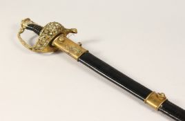 A GOOD NAVAL OFFICERS SWORD in a leather scabbard 3ft 1ins long.