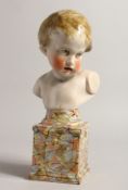 A GOOD PRATTWARE BUST OF O YOUNG BOY ON A PEDESTAL 11ins high.