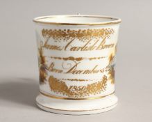 A MUG, inscribed James Carlise Brown, born December 5th, 1850.
