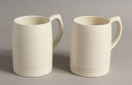 A PAIR OF KEITH MURRAY WEDGWOOD TANKARDS 4.5ins high.