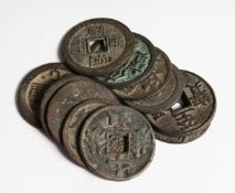 ELEVEN CHINESE BRONZE COINS