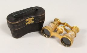 A PAIR OF LATE 19TH CENTURY OPERA GLASSES BY LEMAIRE, PARIS, the gilt body decorated with figures,