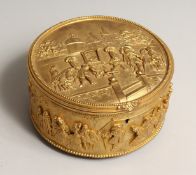 A GOOD FRENCH, GILDED METAL, CIRCULAR JEWEL BOX AND COVER the lid with a leden chair, the sides with