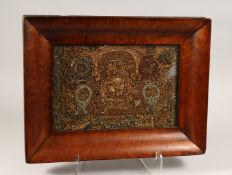 A GEORGIAN SCROLLWORK PAPER PICTURE behind glass in a wooden frame. 8.5ins x 13ins.