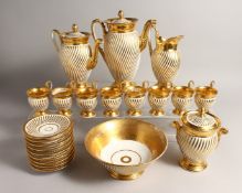 A GOOD PARIS GILDED TEA SET, comprising eight cups and nine saucers, tea pot, coffee pot, sugar