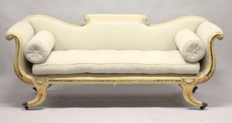 A VERY GOOD REGENCY CREAM PAINTED DOUBLE SCROLLING END SETTEE with padded upholstery and loose