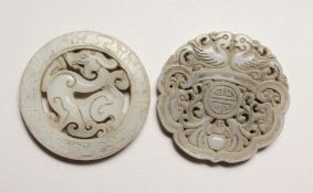 TWO CARVED JADE PENDANTS