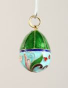 A GOOD RUSSIAN SILVER AND ENAMEL EGG PENDANT