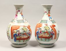 A PAIR OF CHINESE PORCELAIN BOTTLE VASES, painted with figures with attendants 15ins high.