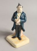 A BRETBY POTTERY STANDING FIGURE, MR PECKSNIFF. No 3087 9ins high.