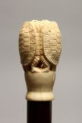 A NOVELTY WALKING STICK WITH CARVED BONE HANDLE, modelled as group of three turtles 35.5ins high.