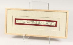 A FRAMED STRIP OF 17TH CENTURY EUROPEAN BONE FRAGMENTS possibly from a casket, soldiers carrying