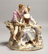 A SUPERB 19TH CENTURY MEISSEN FIGURE OF LOVERS seated on a rock, a lamb by her side, on an oval