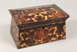 A FAUX TORTOISESHELL TWO DIVISION SARCOPHAGUS SHAPED TEA CADDY 9ins wide