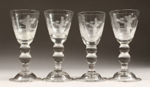 A SET OF FOUR HEAVY WINE GLASSES engraved with a man fishing 7.25ins high.
