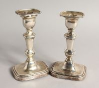 A GOOD PAIR OF VICTORIAN SILVER CANDLESTICKS 6.5ins high. Sheffield 1893