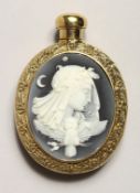 A 9CT. GOLD PLATED CAMEO SCENT BOTTLE
