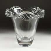 DAUM, 'NANCY' A LARGE HEAVY PLAIN GLASS VASE, the lip as scrolling waves Signed 'Daum'. 12ins high.