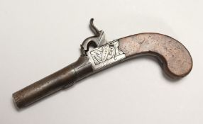 A PERCUSSION CAP PISTOL by DEAKIN, LONDON, with wooden handle 6.5ins long