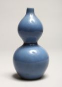 A SMALL CHINESE BLUE DOUBLE GOURD VASE, square mark in blue.