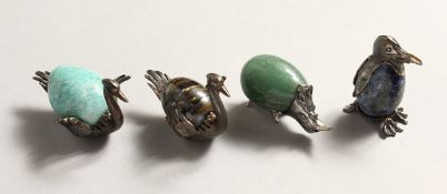 FOUR SILVER MOUNTED `PENGUIN, RHINO, AND TWO SWANS'