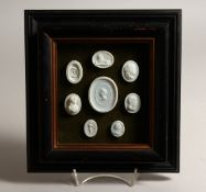 A FRAMED CASE OF CAMEOS including GEORGE AUGUSTAS as PRINCE REGENT, dated 1815. Overall size 9.