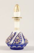 A BOHEMIAN OVERLAY GLASS SCENT BOTTLE AND STOPPER. 8ins high.
