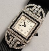 A SUPERB 1920'S CARTIER ART DECO DIAMOND AND SAPPHIRE COCKTAIL WATCH