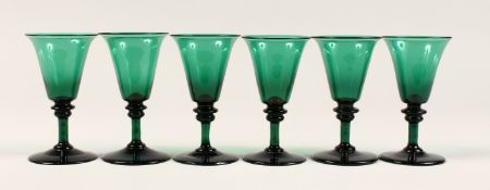 A SET OF SIX GREEN GLASSES 5ins high