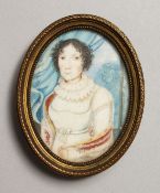A GOOD OVAL PORTRAIT MINIATURE OF A LADY