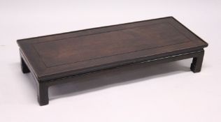 A GOOD CHINESE REDWOOD RECTANGULAR TOP OPIUM TABLE with cross banded top. 3ft 4ins long, 1ft 4ins