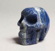 A CARVED LAPIS SKULL 2ins.