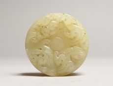 A CARVED CIRCULAR JADE BOX AND COVER 2.25ins diameter