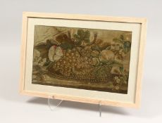 A FRAMED AND GLAZED NEEDLEWORK PICTURE OF FRUIT, in a basket. 10ins x 15ins.