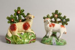 TWO STAFFORDSHIRE BOCAGE GROUPS OF A SHEEP with Bocage backs. 5.5ins & 4.5ins high.