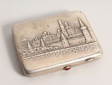 A 19TH CENTURY RUSSIAN SILVER AND ENAMEL CIGARETTE CASE, the lid repousse with a scene of Moscow.