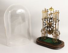 A VERY GOOD BRASS SKELETON CLOCK CATHEDRAL SHAPED, striking on a single bell with glass dome.
