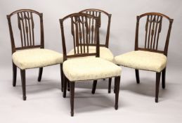 A SET OF FOUR HEPPLEWHITE DESIGN MAHOGANY DINING CHAIRS, with arched top, carved vertical tie