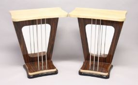 A PAIR OF UNUSUAL CREAM LACQUERED AND ROSEWOOD CONSOLE TABLES, the tops supported by three metal