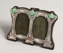 A SMALL DOUBLE SILVER PHOTOGRAPH FRAME 3ins x 4ins.