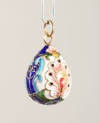A GOOD RUSSIAN SILVER AND ENAMEL EGG PENDANT