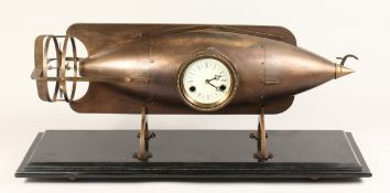 AN UNUSUAL INDUSTRIAL STYLE COMBINATION CLOCK, modelled as a torpedo, on a rectangular marble base