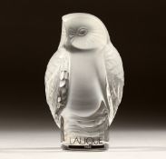A LALIQUE GLASS OWL, engraved Lalique, France, in a fitted box 3.75ins high