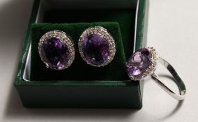 A PAIR OF SILVER AMETHYST AND ZIRCON EAR RINGS AND RING.