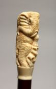 A WALKING STICK WITH CARVED BONE HANDLE, modelled an elephant.
