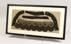 FIVE PIECES OF BLACK CHANTILLY LACE, framed and glazed. 9.5ins x 22ins.
