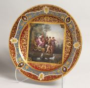 A SUPERB 19TH CENTURY VIENNA CIRCULAR DISH with high quality painting and gilding, the centre with