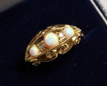 A GOLD PLATED OPAL AND DIAMOND RING.